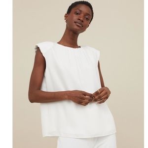 H&M White sleeveless shoulder pad Top